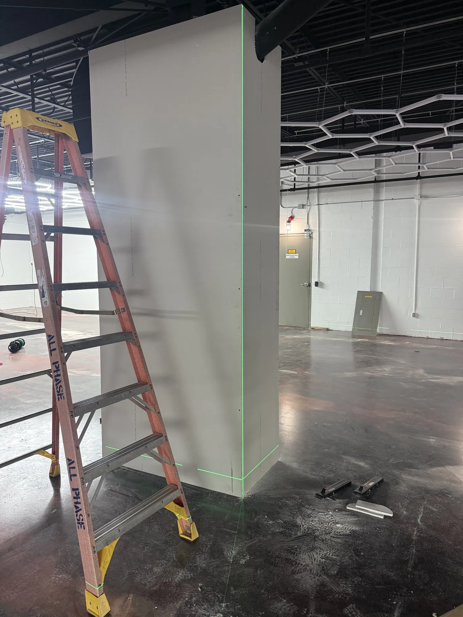 Enclosure going up, walls set to the laser line.