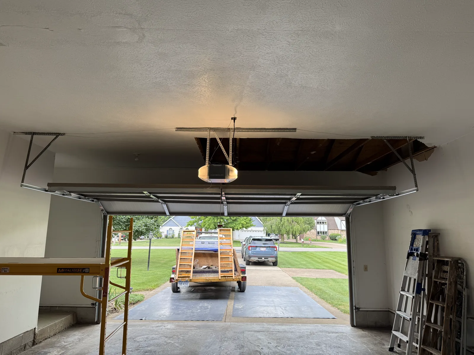 The original ceiling, already coming apart near the door.